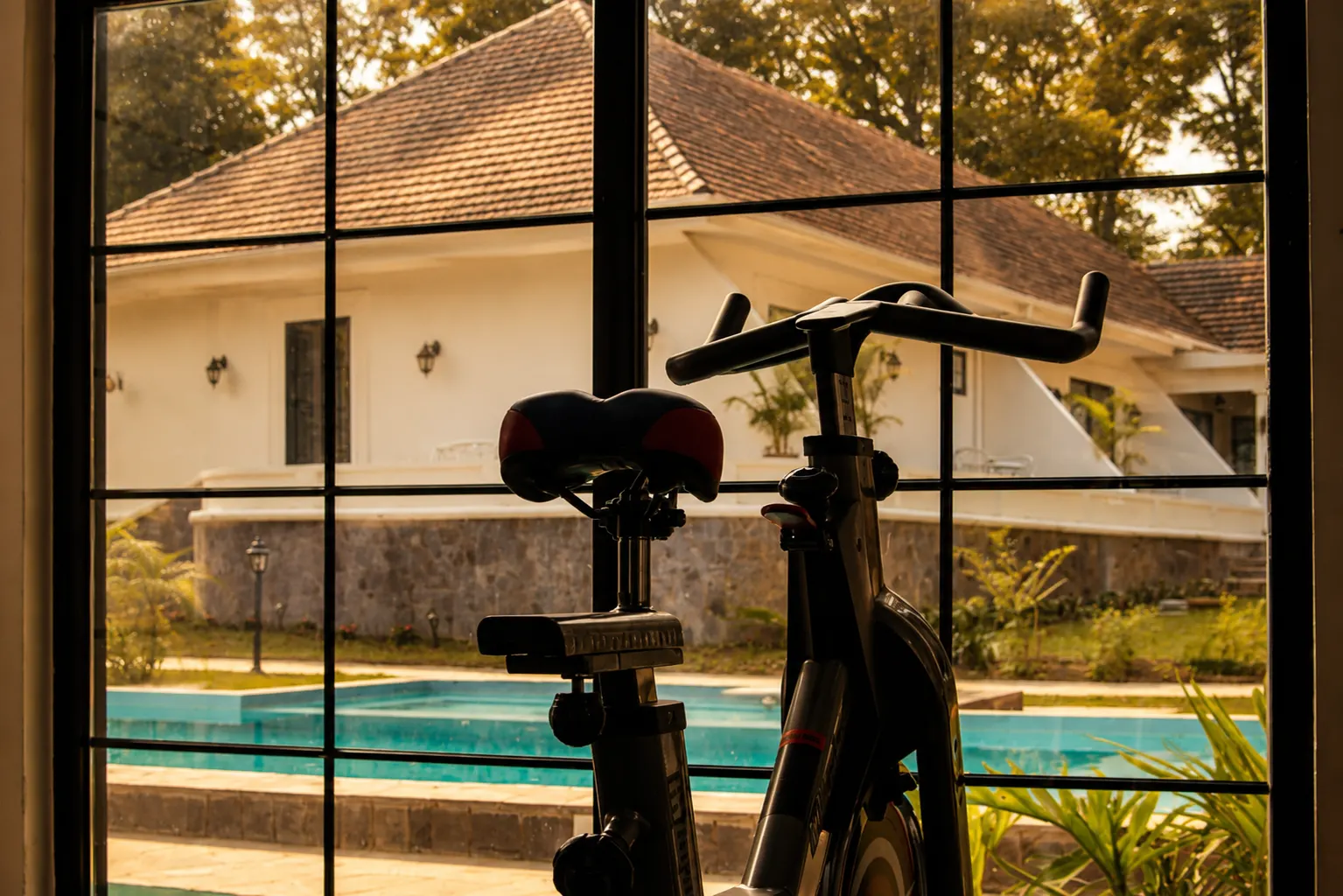 Fitness studio overlooking the garden at Haile Boutique Hotel in Arusha, Tanzania.